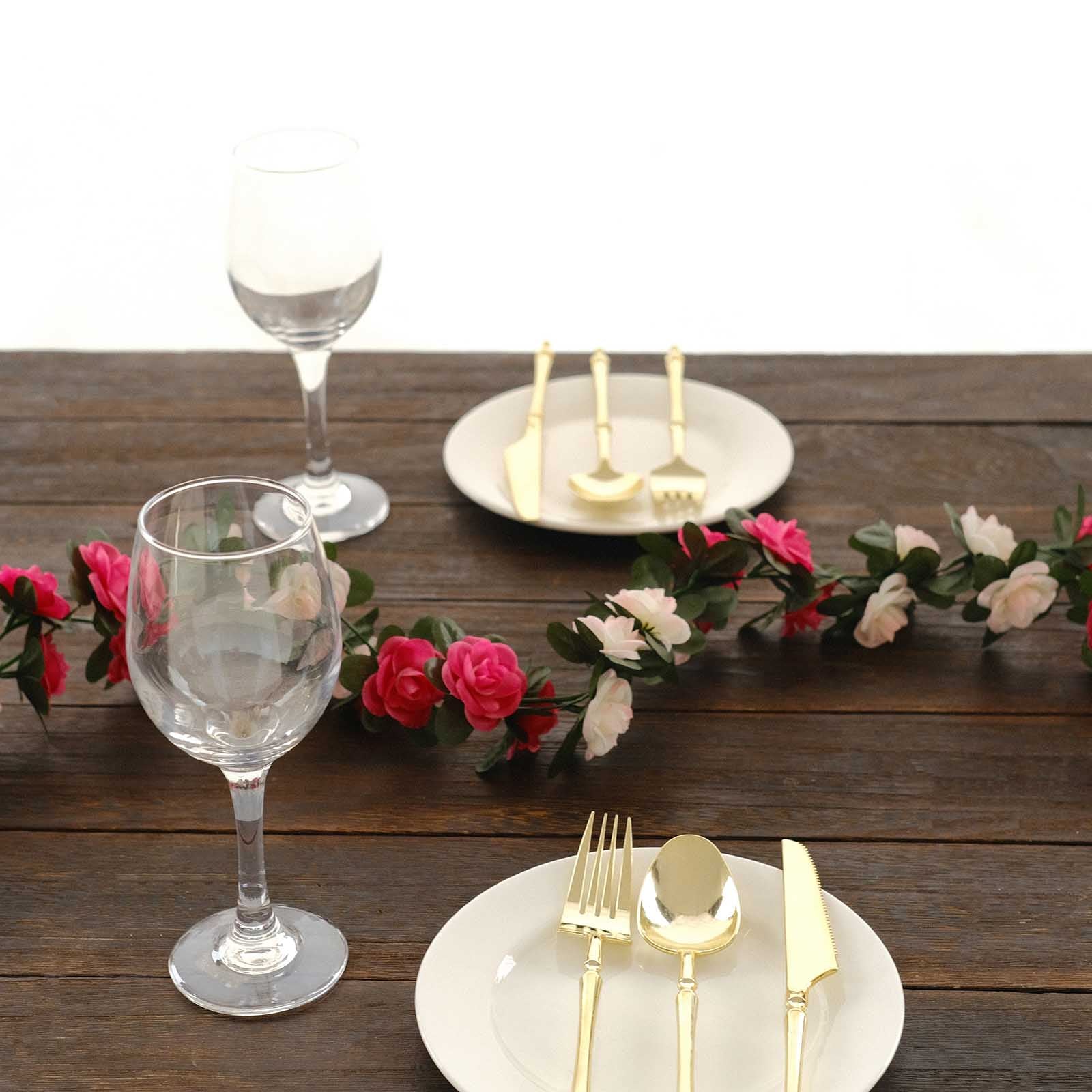 Blush fuchsia artificial silk flower garland with mini rose vines.