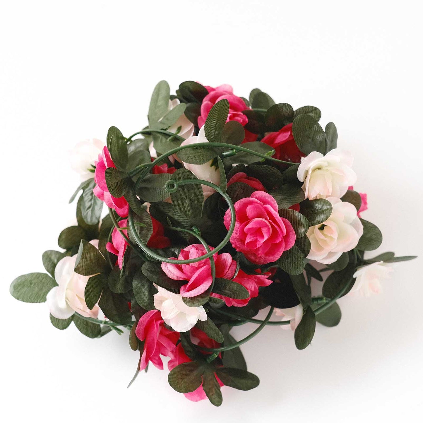 Blush fuchsia artificial silk flower garland with mini rose vines.