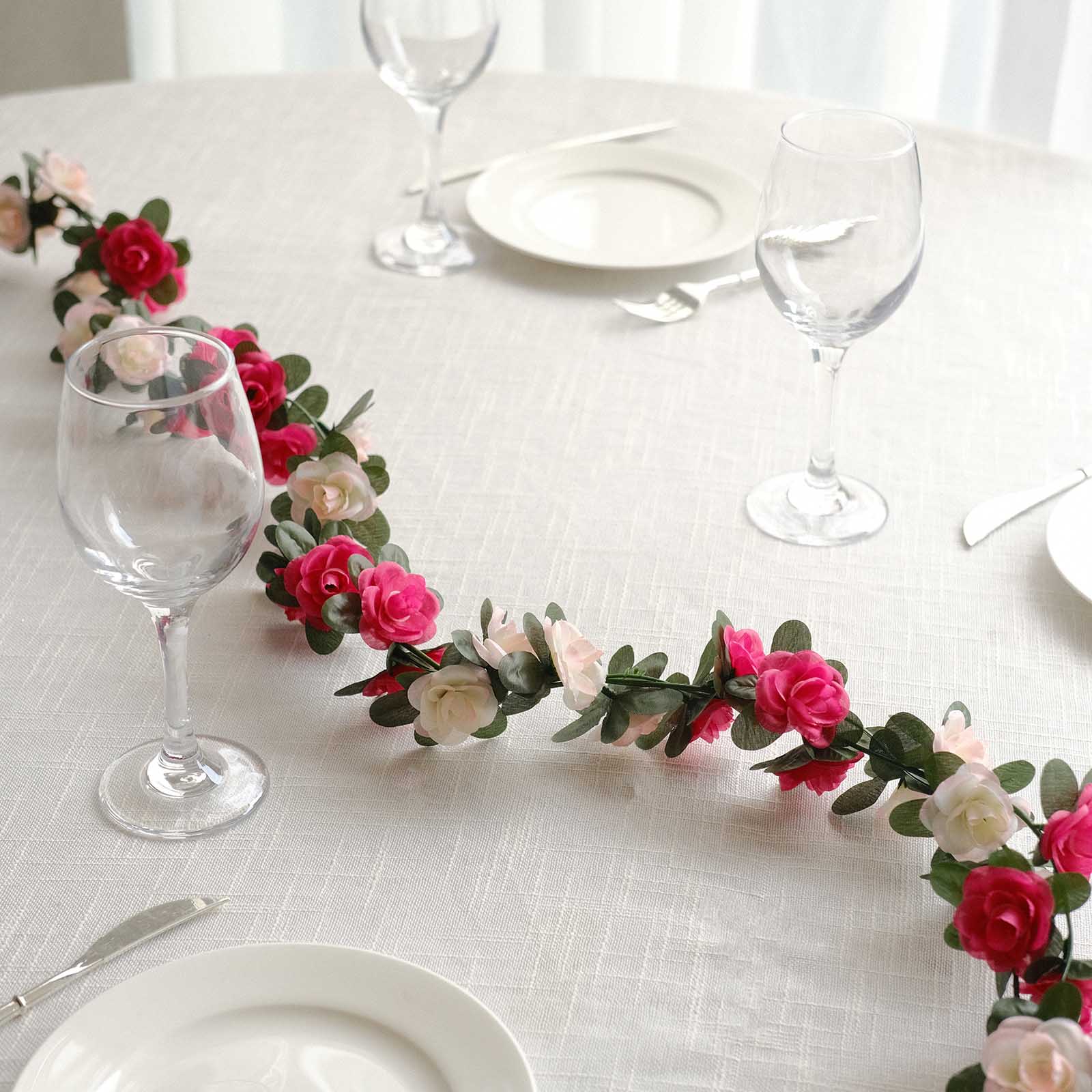 Blush fuchsia artificial silk flower garland with mini rose vines.
