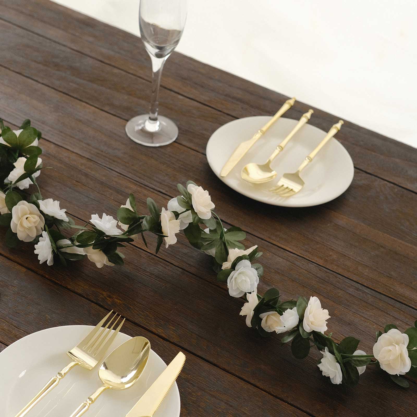 Cream ivory artificial silk flower garland with mini rose vines.