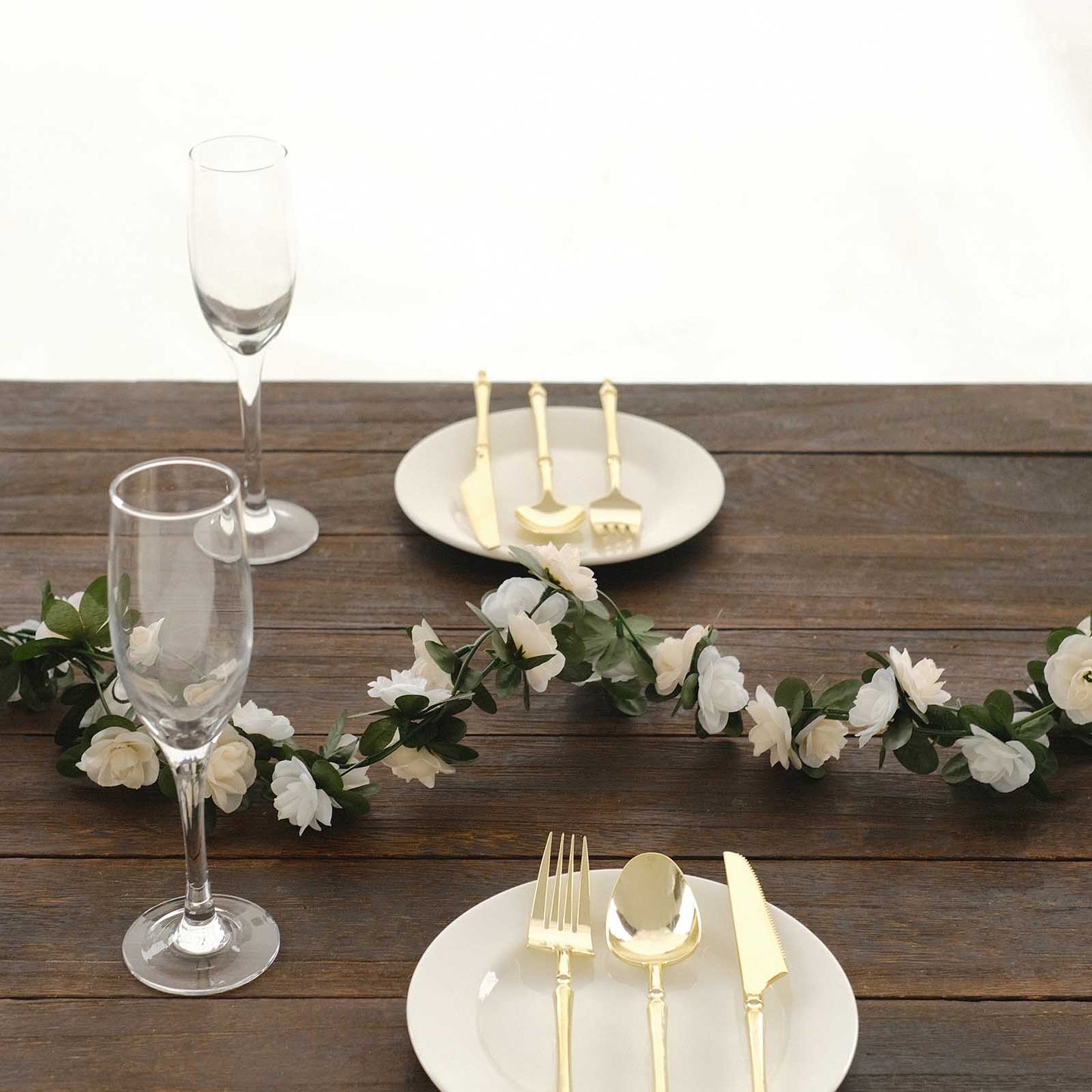 Cream ivory artificial silk flower garland with mini rose vines and 45 flower heads.