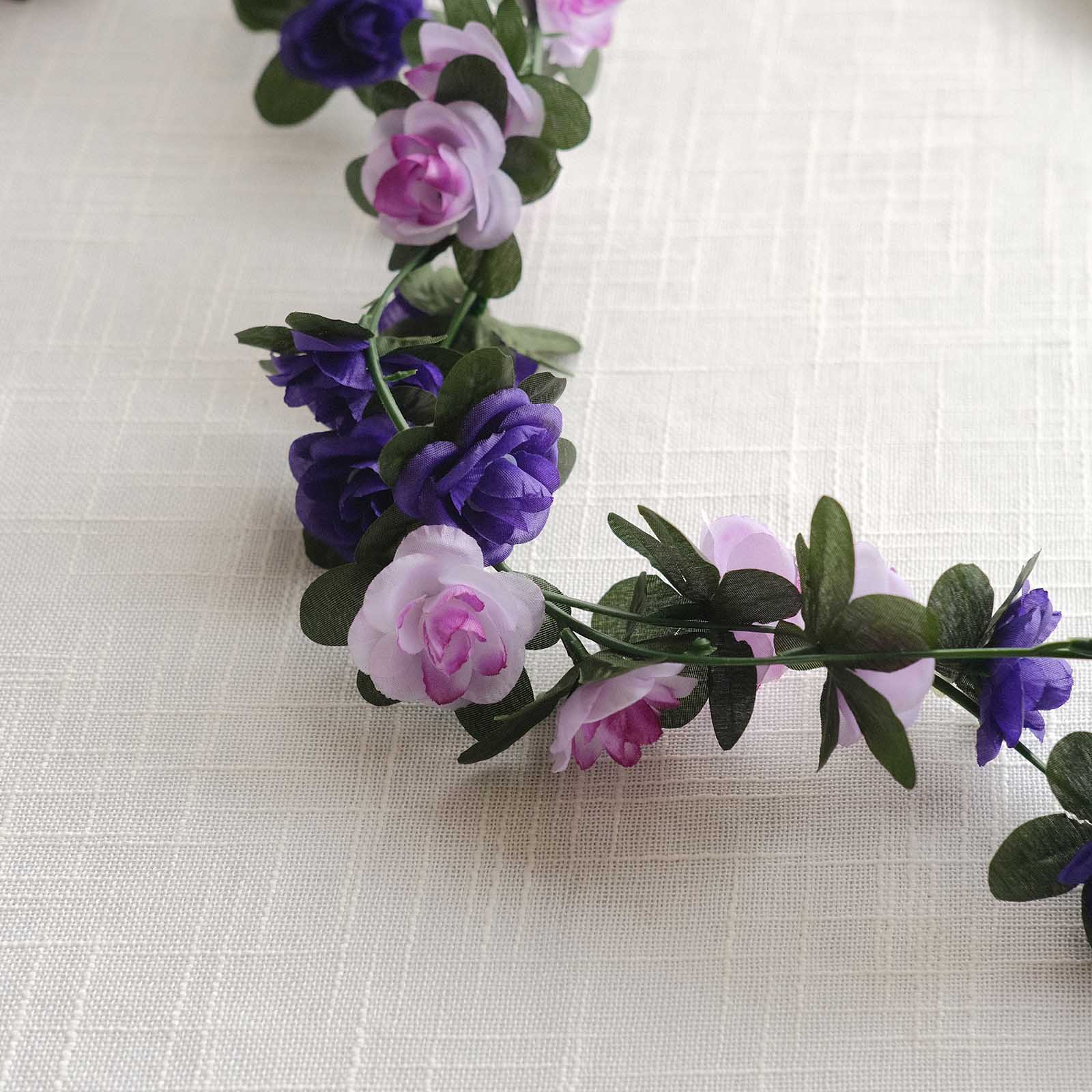 Lavender purple artificial silk flower garland with mini rose vines.