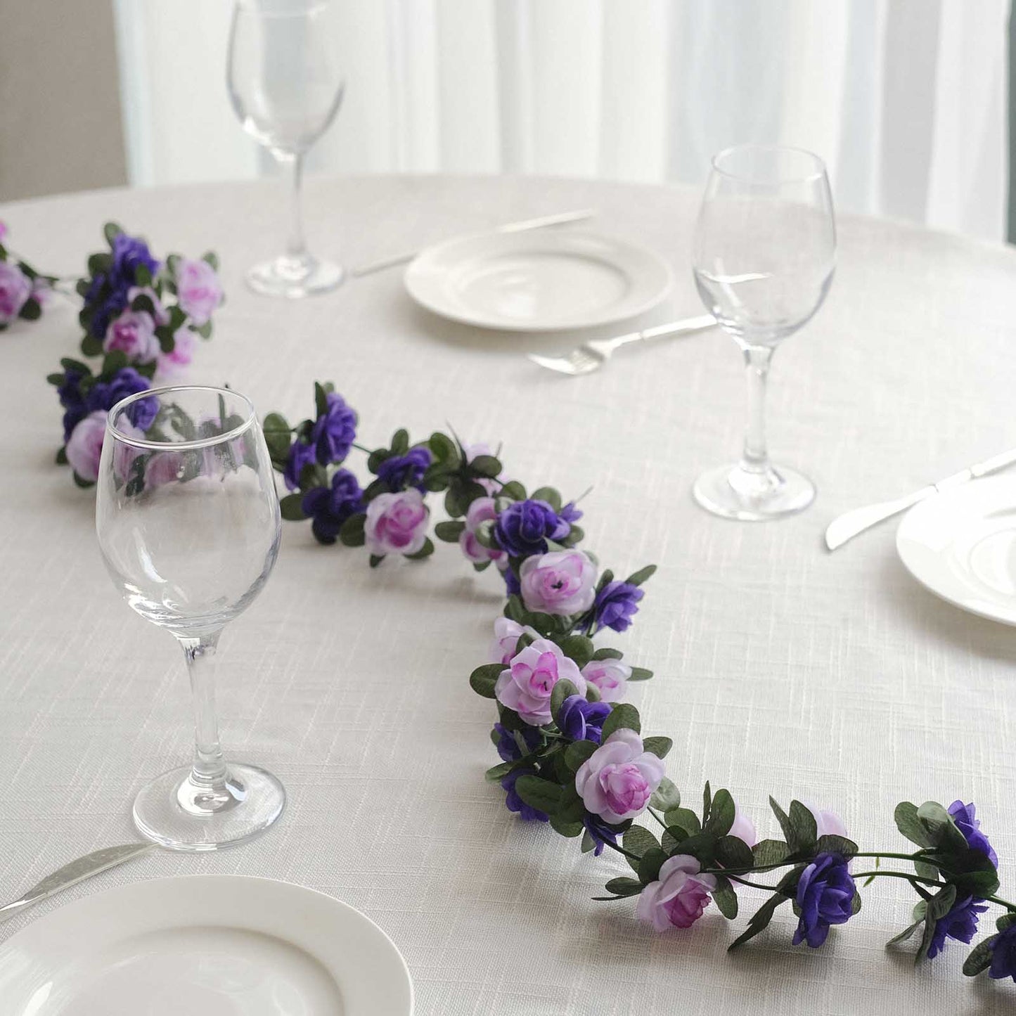 Lavender purple artificial silk flower garland with mini rose vines.