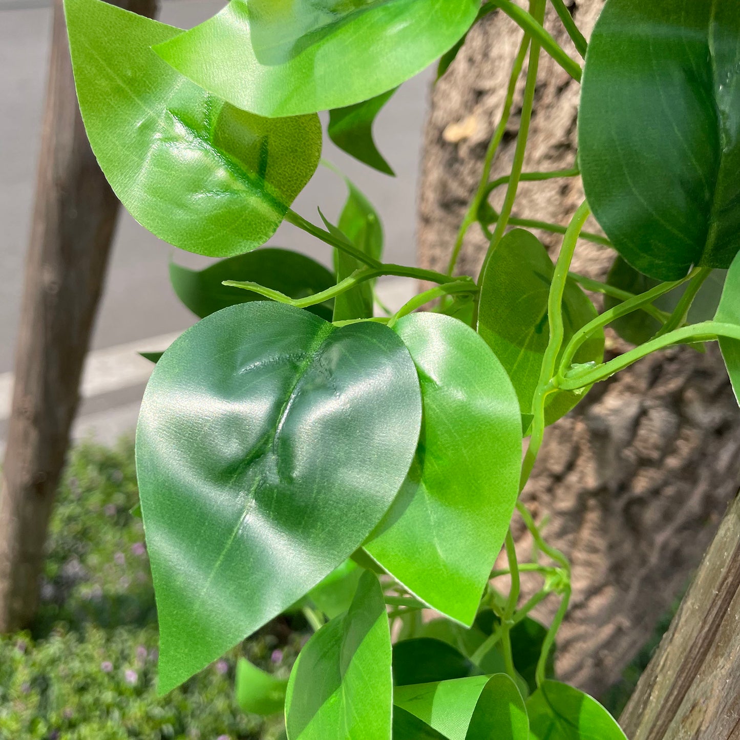Green Pothos artificial ivy vine hanging plant with silk leaves.