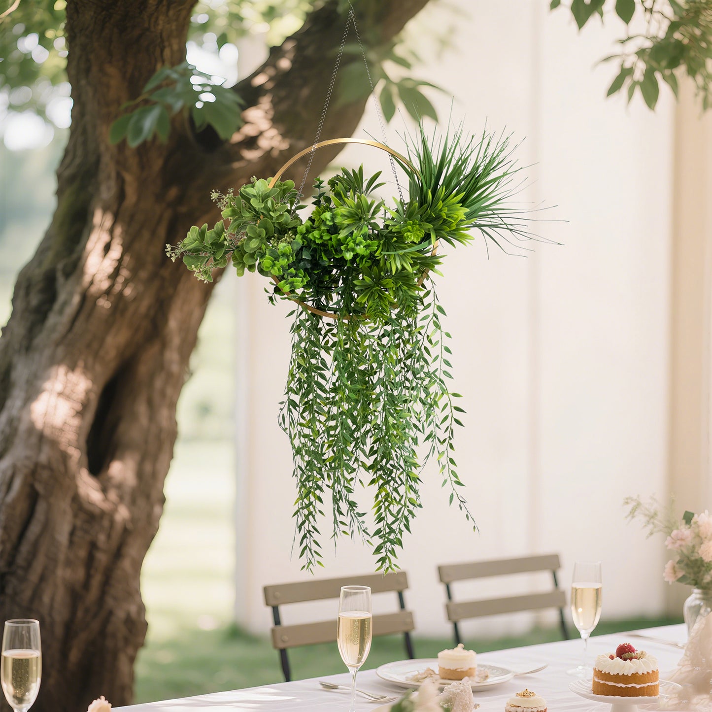 Faux hanging greenery with gold hoop, perfect for tablescapes, 38" long.