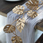 7ft metallic gold artificial monstera leaf hanging vine plant garland.