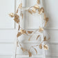 7ft metallic gold artificial monstera leaf hanging vine plant garland.