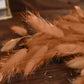 Brown dried pampas grass flower bouquet arrangements.