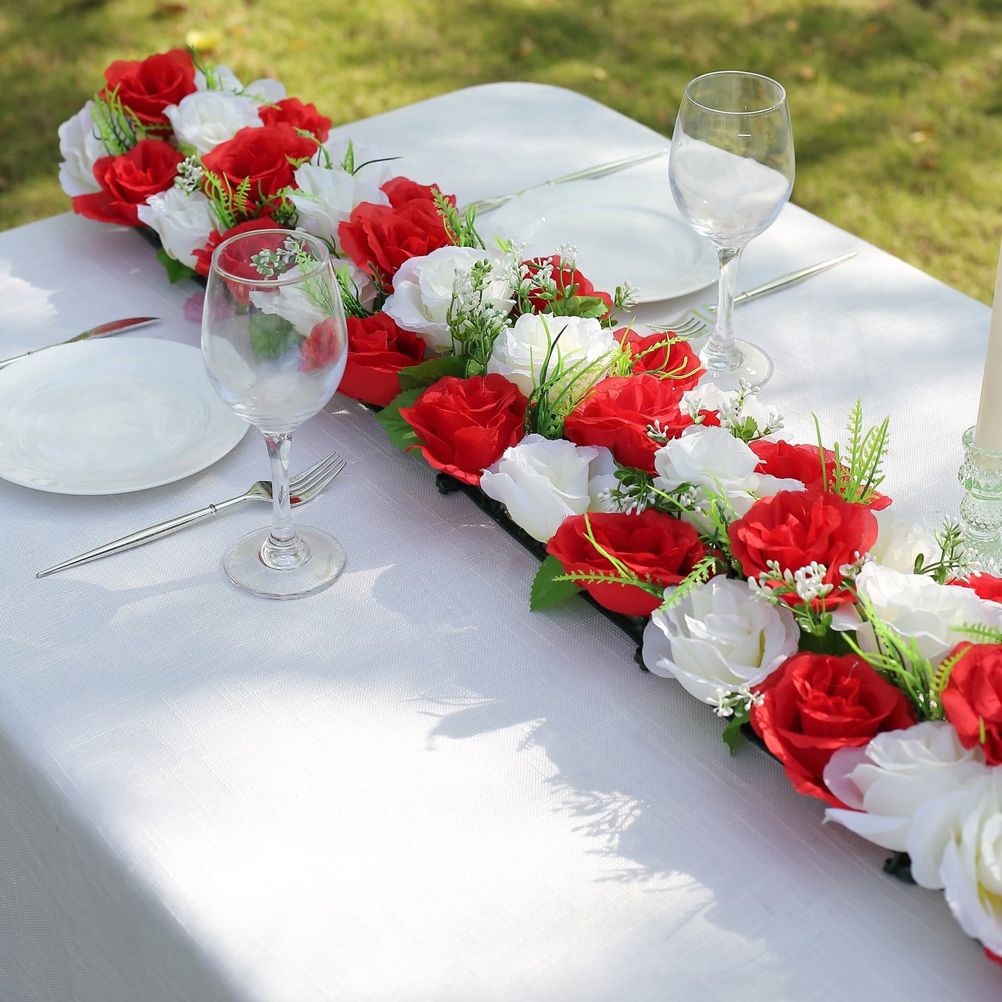 Red and ivory silk rose flower table runner for wedding centerpiece.