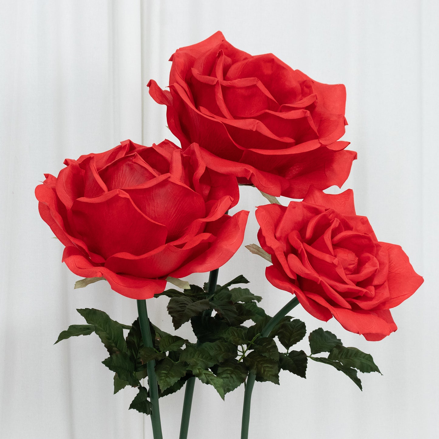 Giant red artificial rose set, 3 faux flowers up to 4.5ft tall for events.