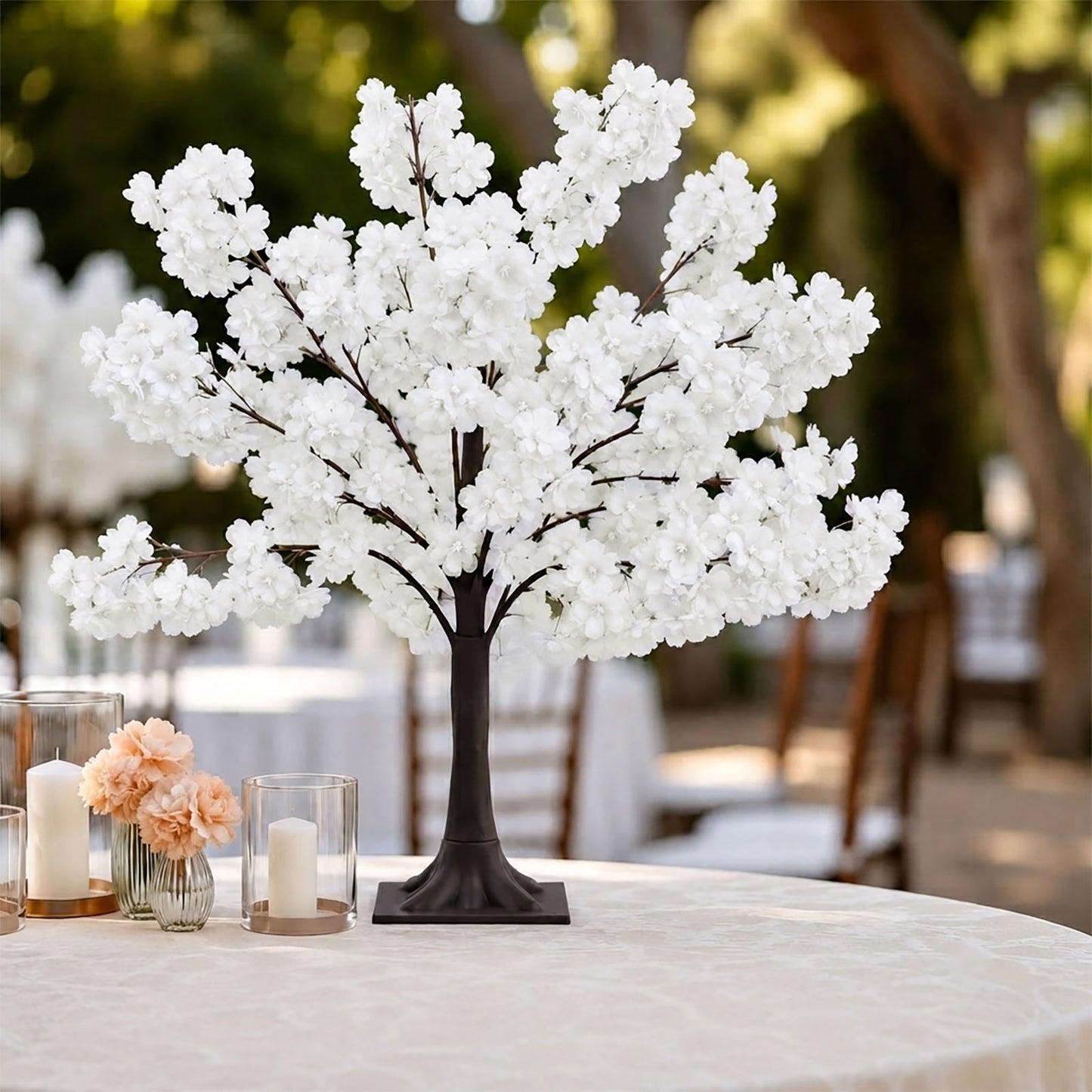 White silk cherry blossom tree centerpiece with a metal base.