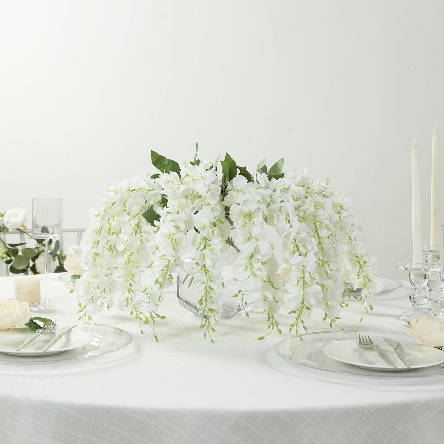 White hanging artificial wisteria vines for elegant decor.
