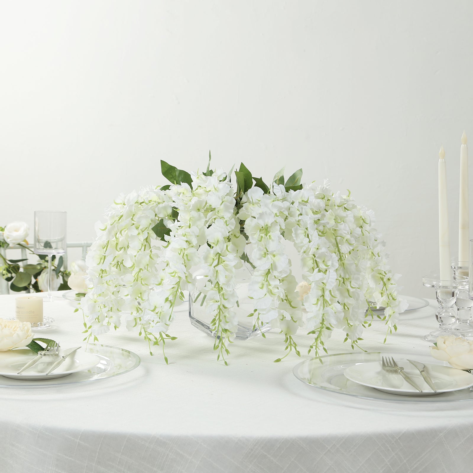 White hanging artificial wisteria vines for elegant decor.