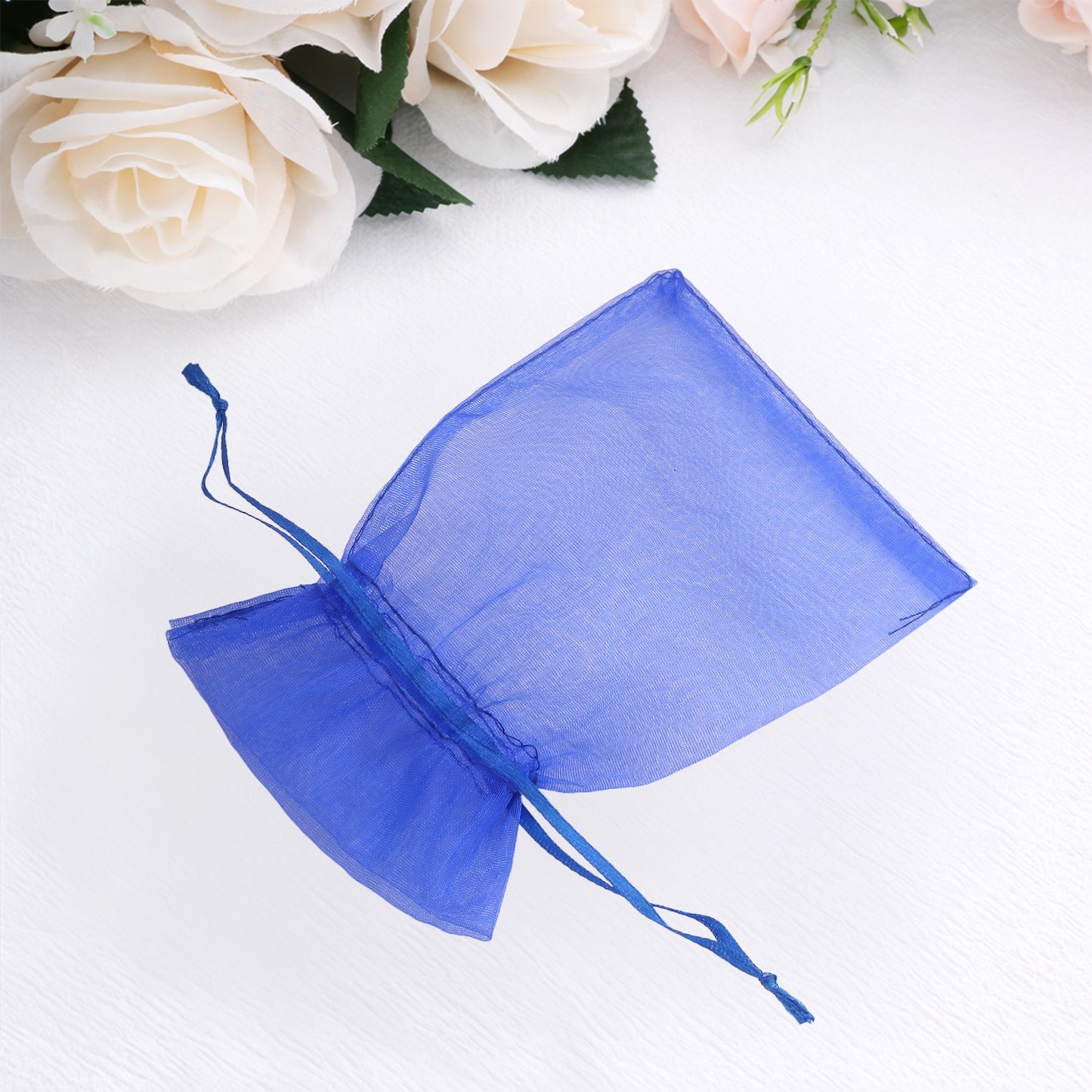 Royal blue organza gift bag with drawstring, 4" x 6".
