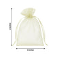 Yellow organza gift bag, 4" x 6", with drawstring for party favors.