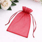 Burgundy organza gift bag with drawstring, perfect for wedding favors.