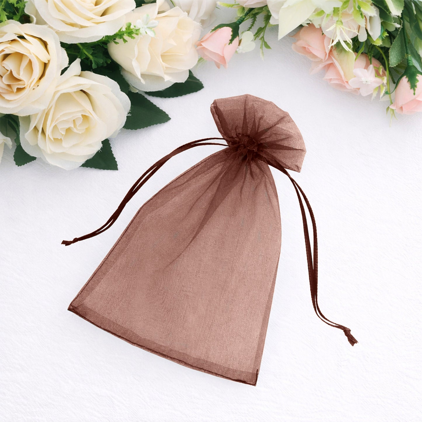 Brown organza gift bag with drawstring, perfect for wedding favors.