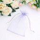 Lavender organza gift bag with drawstring for wedding favors.