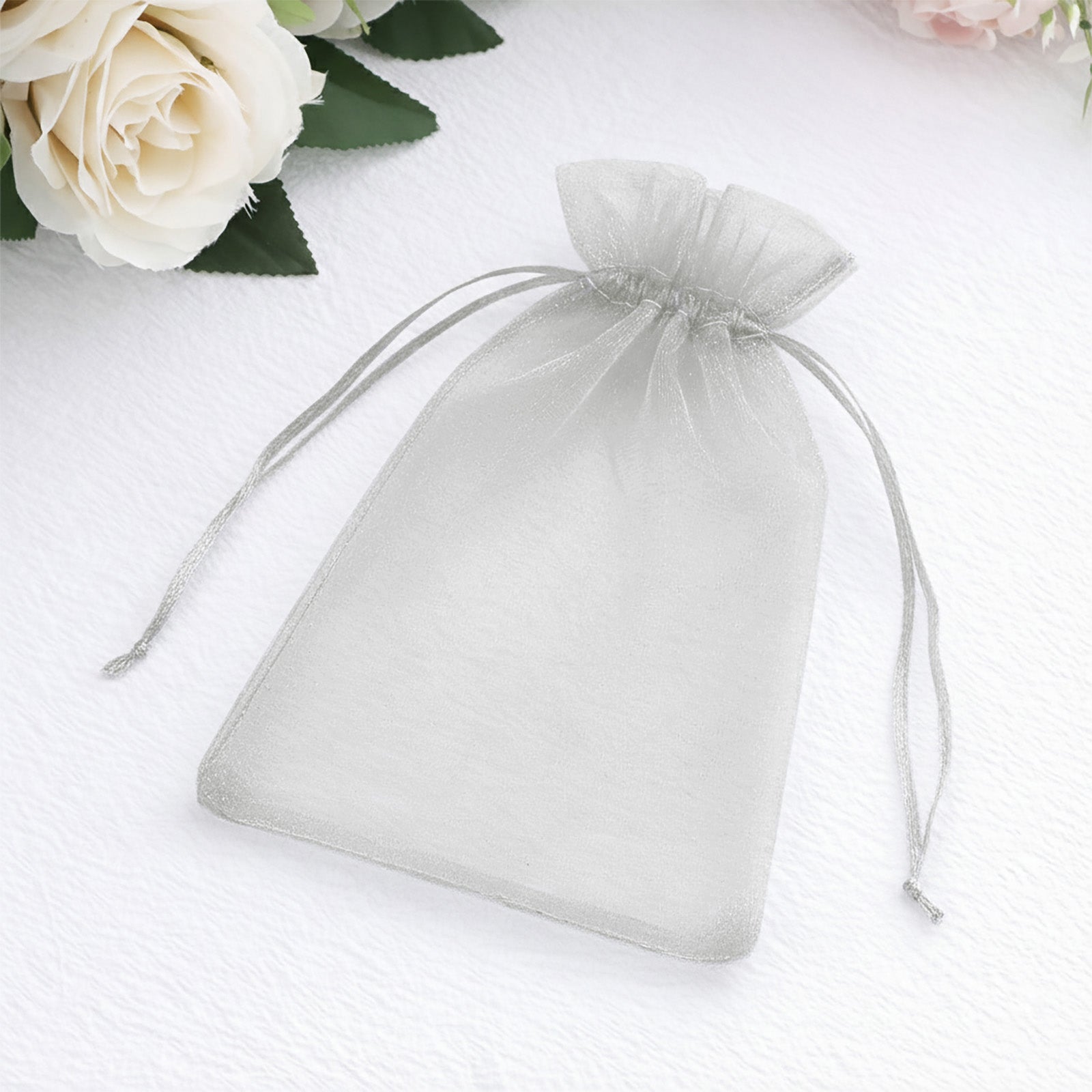 Silver organza gift bag, 5" x 7", perfect for wedding party favors.