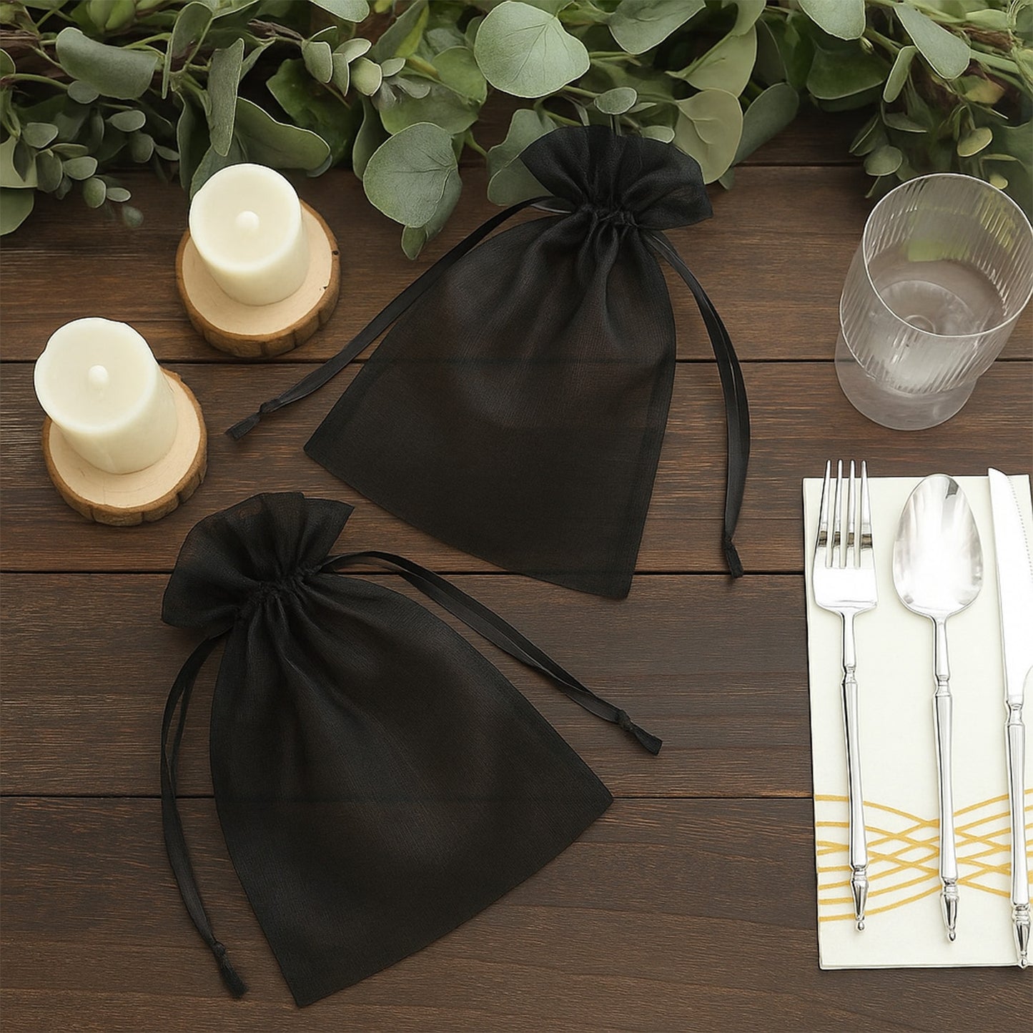 Black organza gift bags with drawstring, perfect for wedding favors.