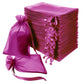 Fuchsia organza gift bags with drawstring, perfect for wedding favors.