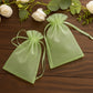 Mint organza gift bags with drawstring, perfect for wedding favors.
