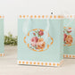 12-Pack Favor Bags Vintage Rose Floral Tea Party, Turquoise Paper Goodie Gift Bags with Ribbon Handles, 6"x7"x3"