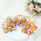 Clear PVC favor bags with floral print, self-adhesive, 6"x7".
