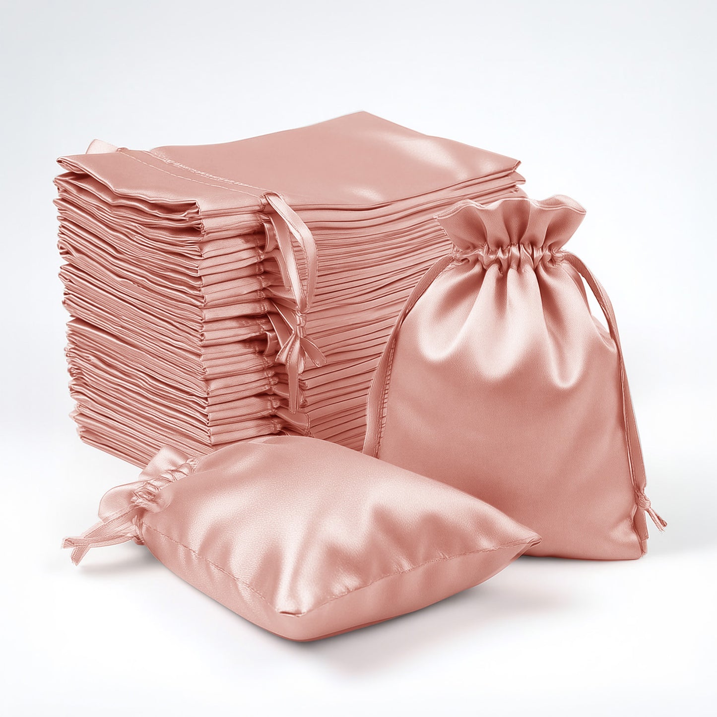 Dusty rose satin drawstring favor bags for jewelry and candy, 60 pack.