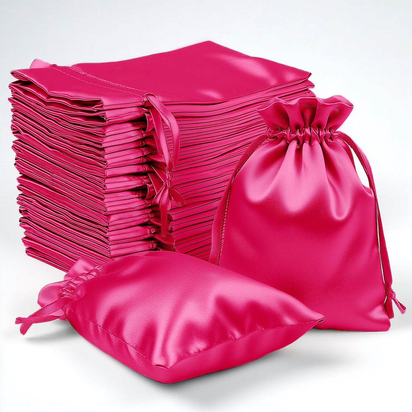 Fuchsia satin drawstring gift bags, 60 pack for weddings and parties.