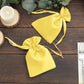 Yellow satin drawstring gift bags for weddings and parties. 60 pack, 4"x6".