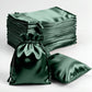 Hunter emerald green satin drawstring gift bags, perfect for weddings and parties.