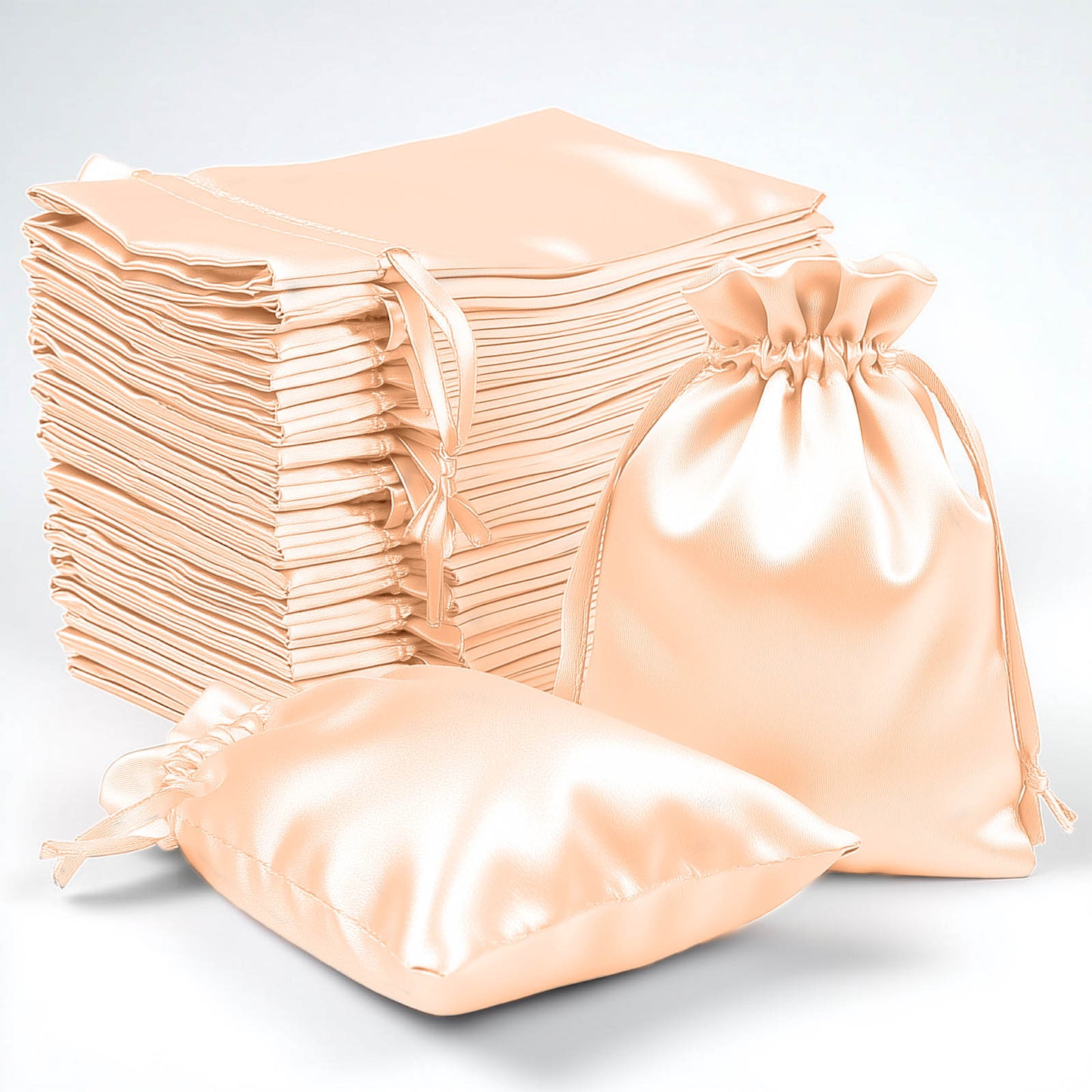 Peach satin drawstring pouches for wedding party favors, 60 pack.