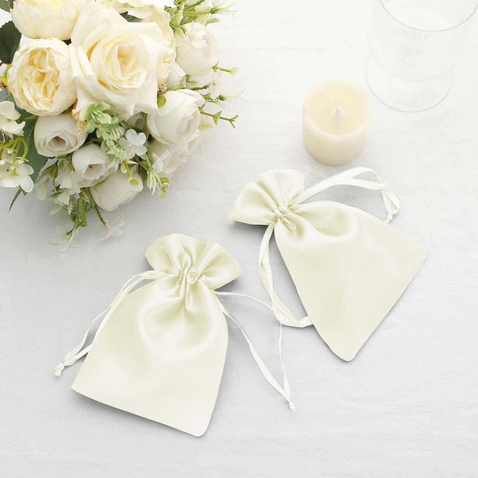 White satin drawstring pouches for wedding party favors, set of 60.
