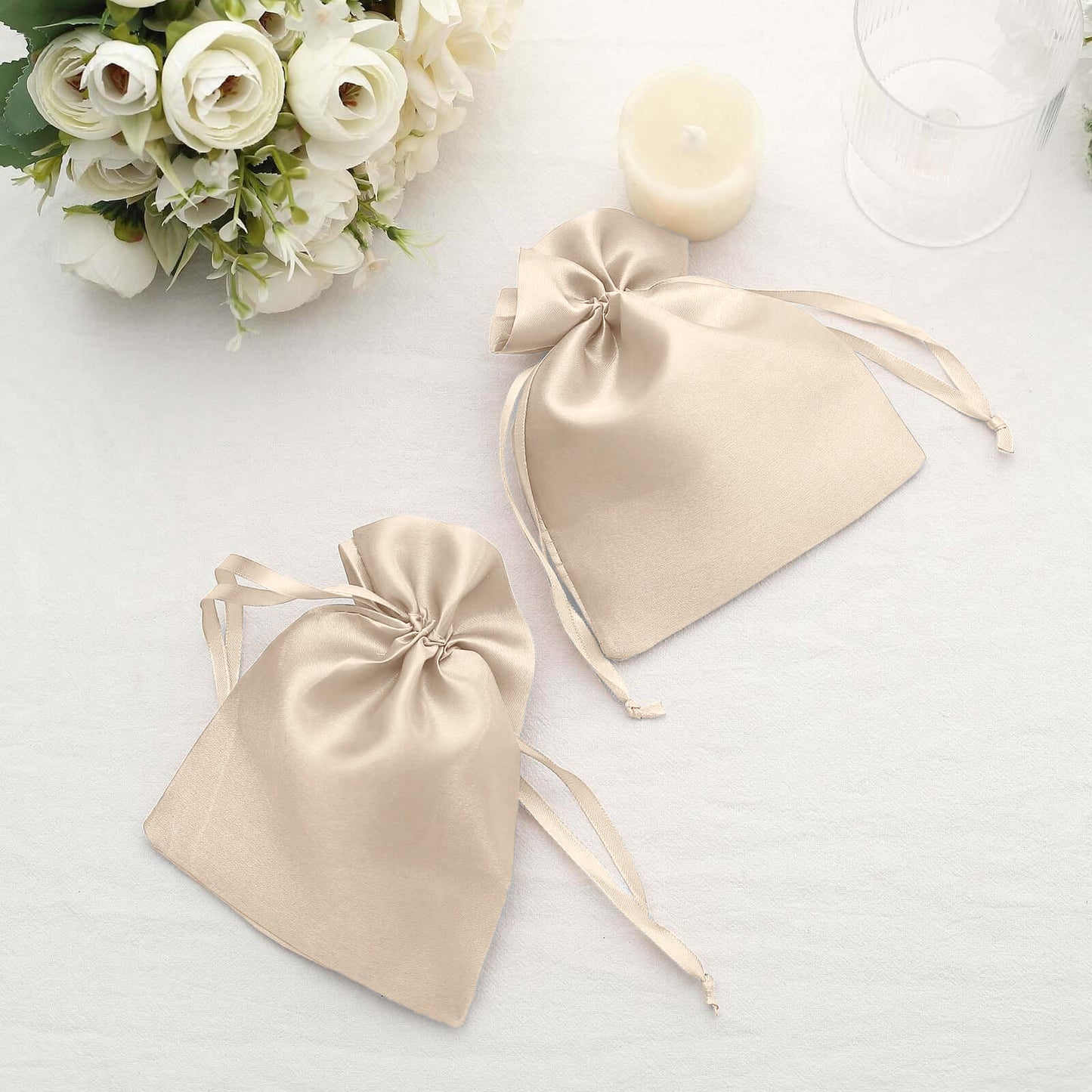 Beige satin drawstring gift bags for weddings and parties, 60 pack.