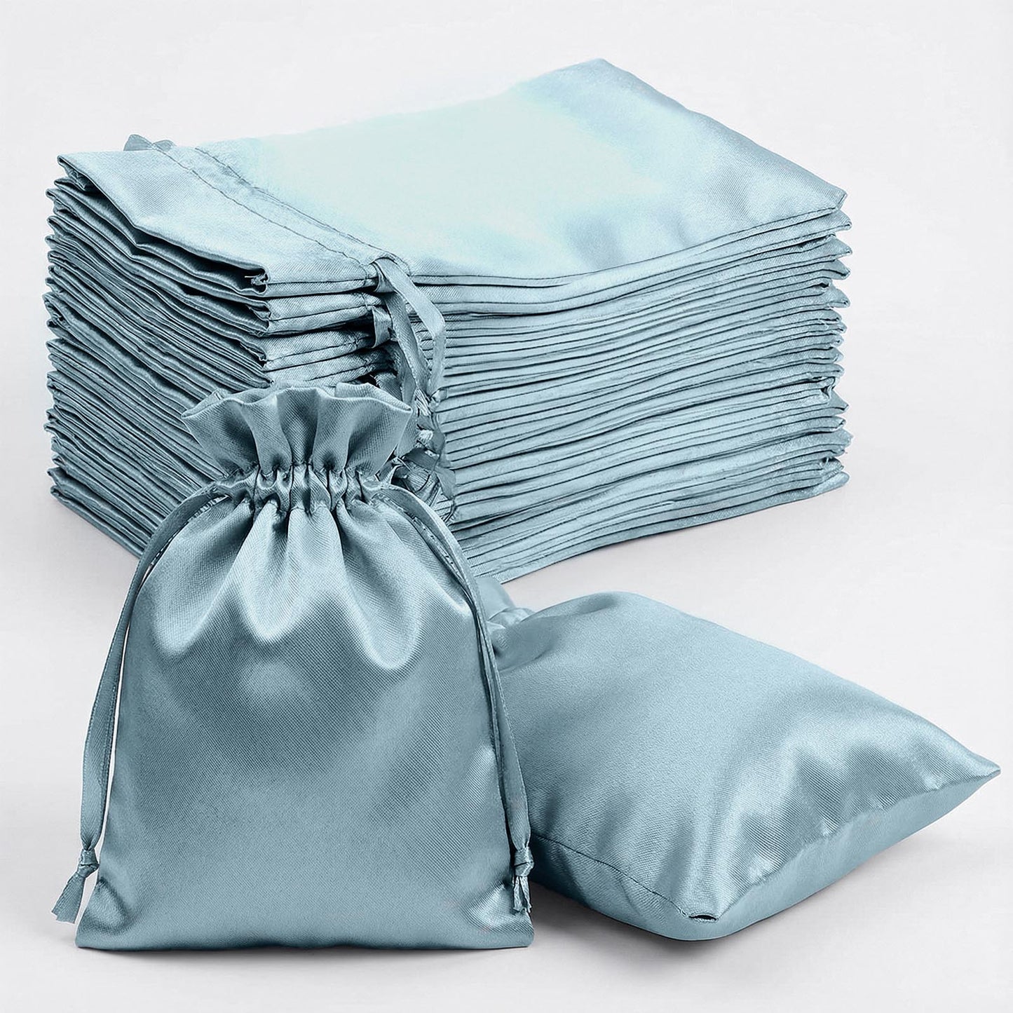 Dusty blue satin drawstring bags for wedding party favors. 60 pack.