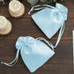 Light blue satin drawstring gift bags for weddings and parties.