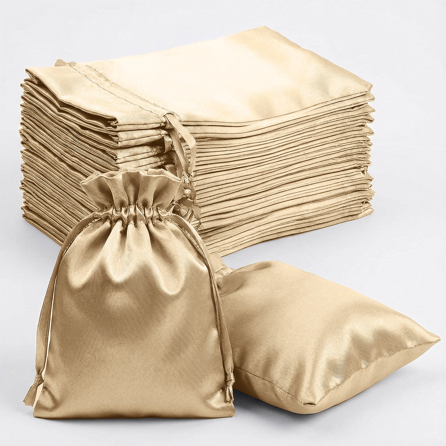 Champagne satin drawstring favor bags for weddings and parties. 60 pack.