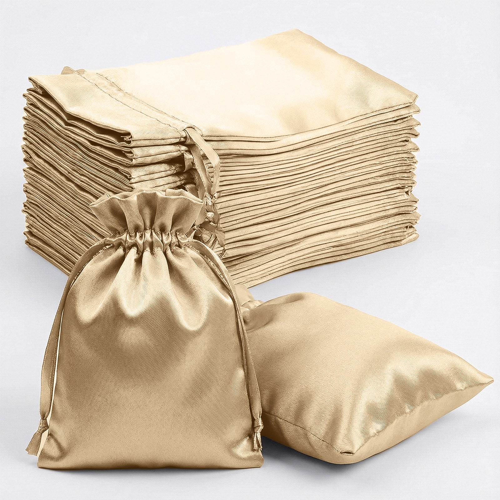 Champagne satin drawstring favor bags for weddings and parties. 60 pack.