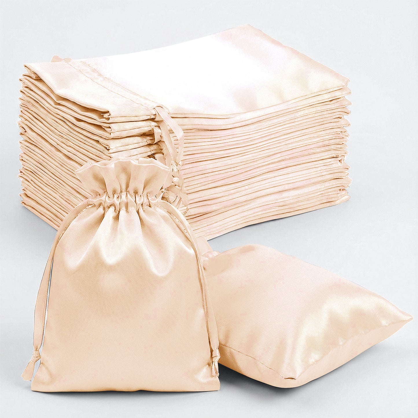 Peach satin drawstring gift bags in a 60 pack.
