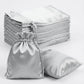 Silver satin drawstring wedding favor bags, 60 pack, 5"x7".