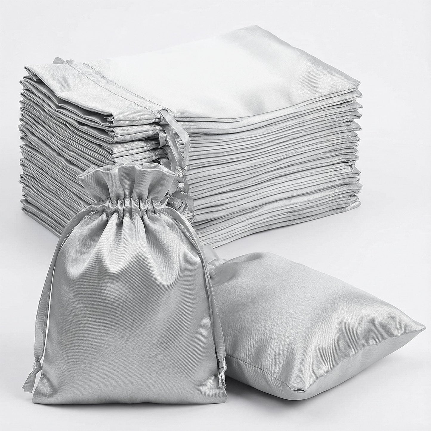 Silver satin drawstring wedding favor bags, 60 pack, 5"x7".