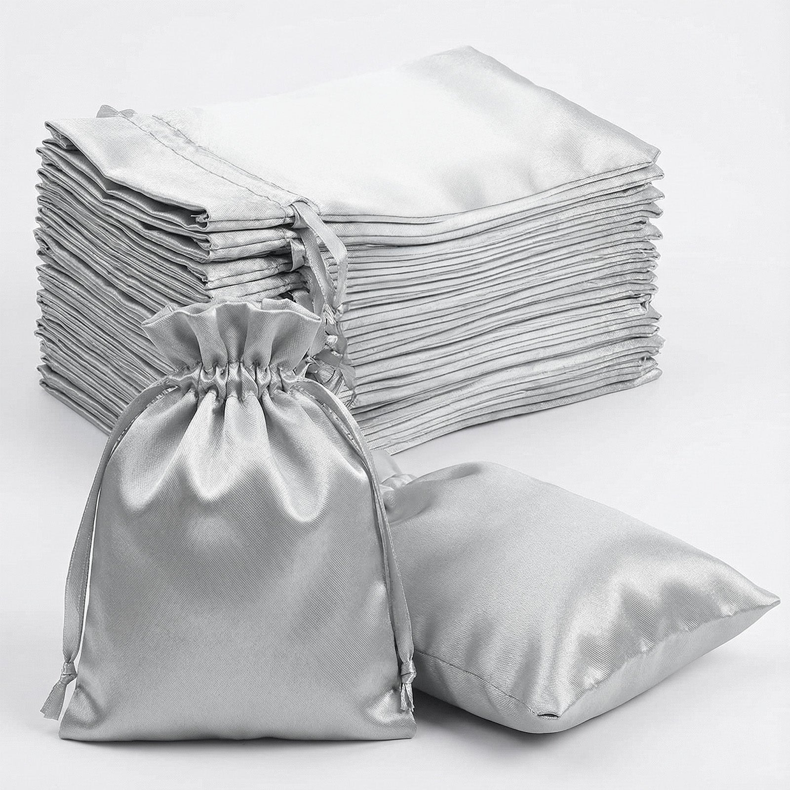 Silver satin drawstring wedding favor bags, 60 pack, 5"x7".