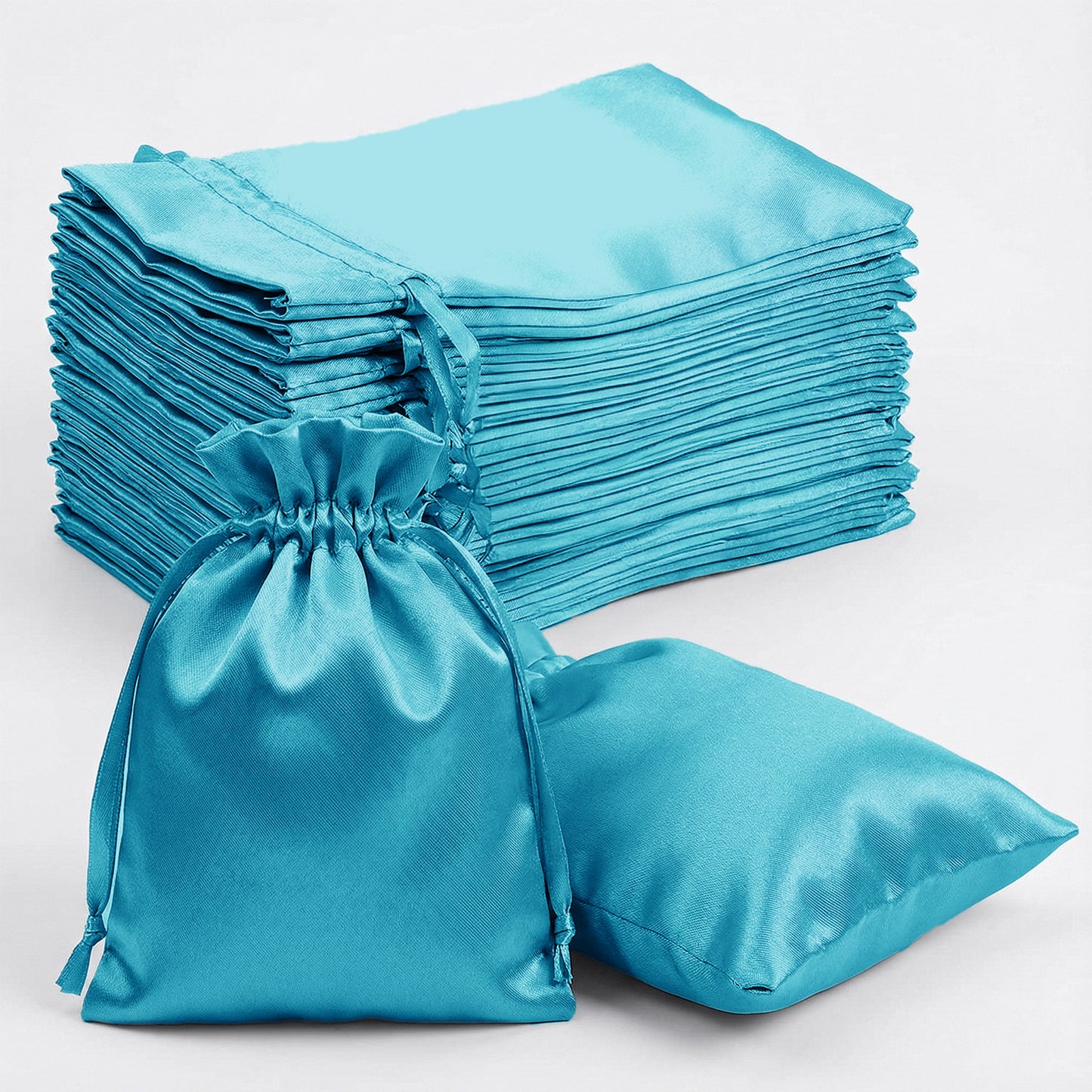 Turquoise satin drawstring gift bags for weddings and parties, 60 pack.