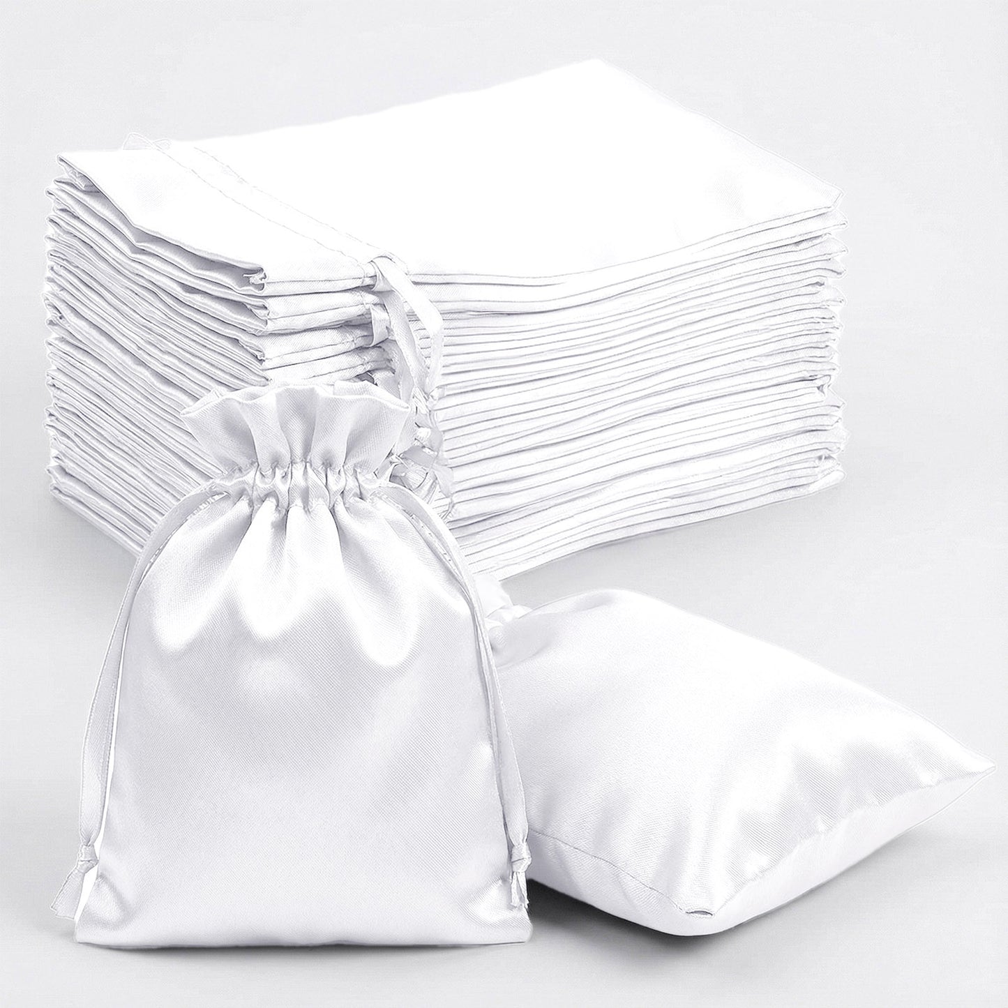 White satin drawstring wedding party favor gift bags, 60 pack.