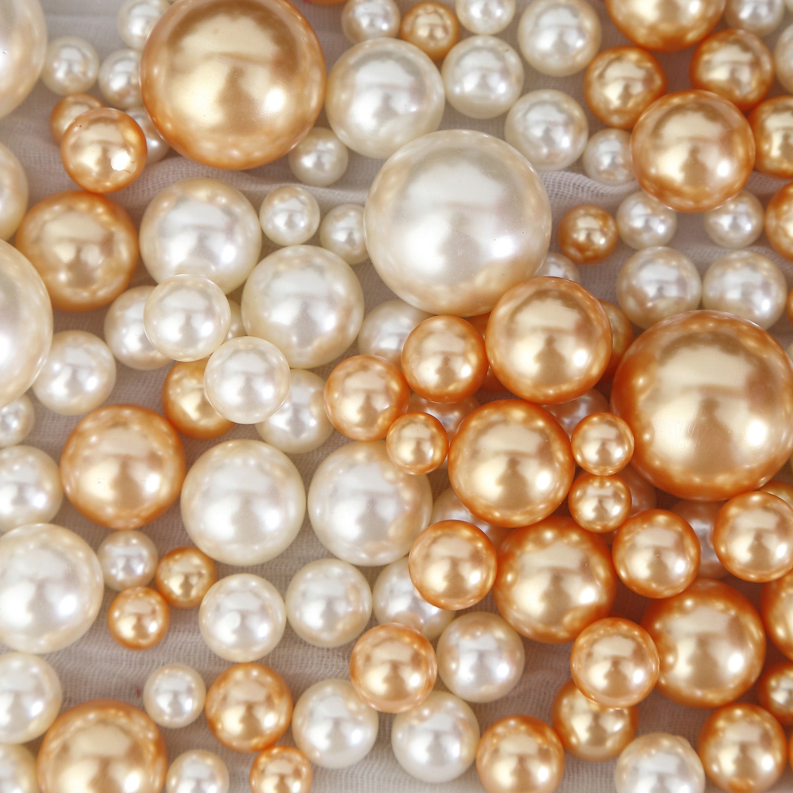 Off white and gold faux pearl beads for DIY crafts and vase fillers.
