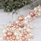 Rose gold and off white faux pearl beads vase fillers.