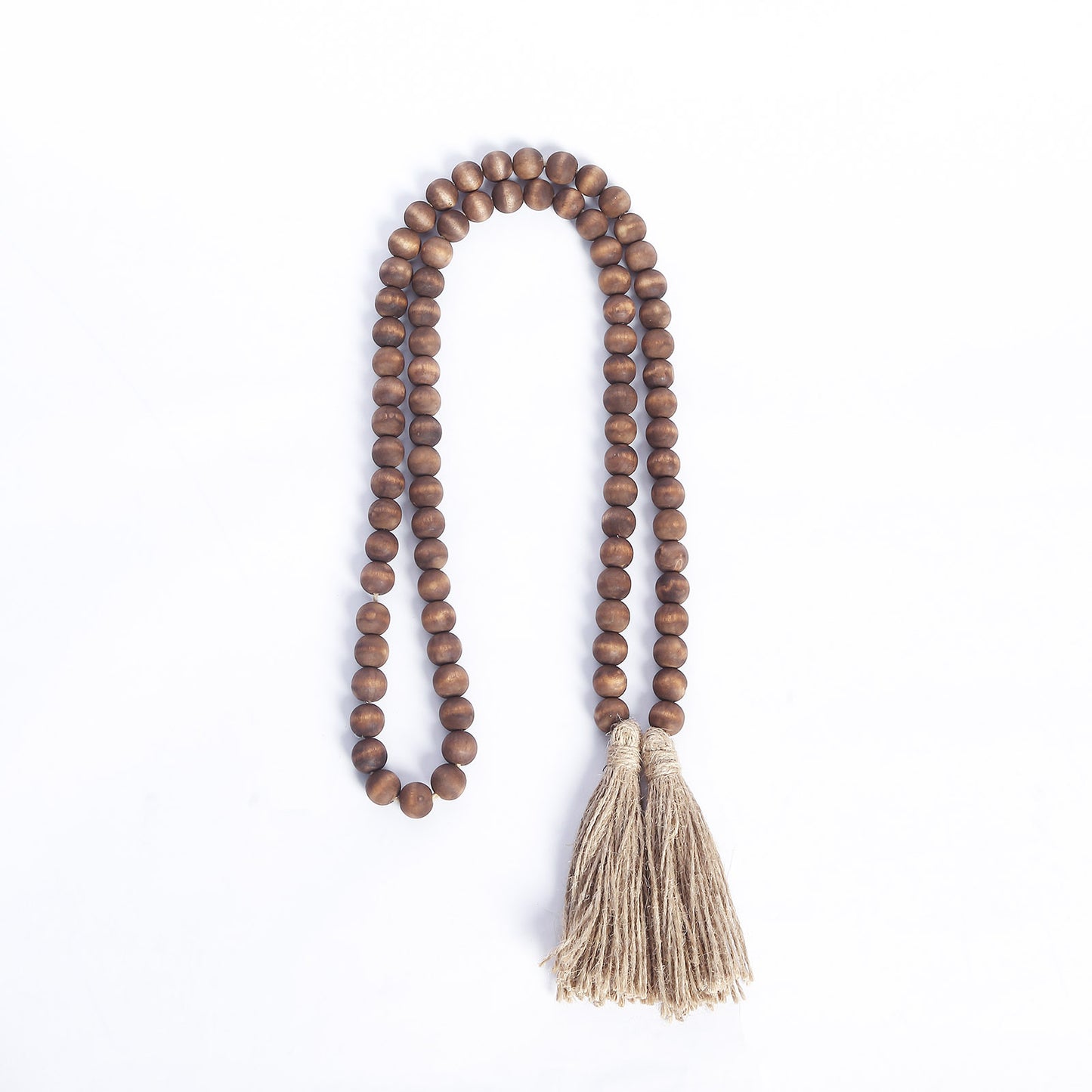 Brown rustic boho chic wood bead garland with tassels.