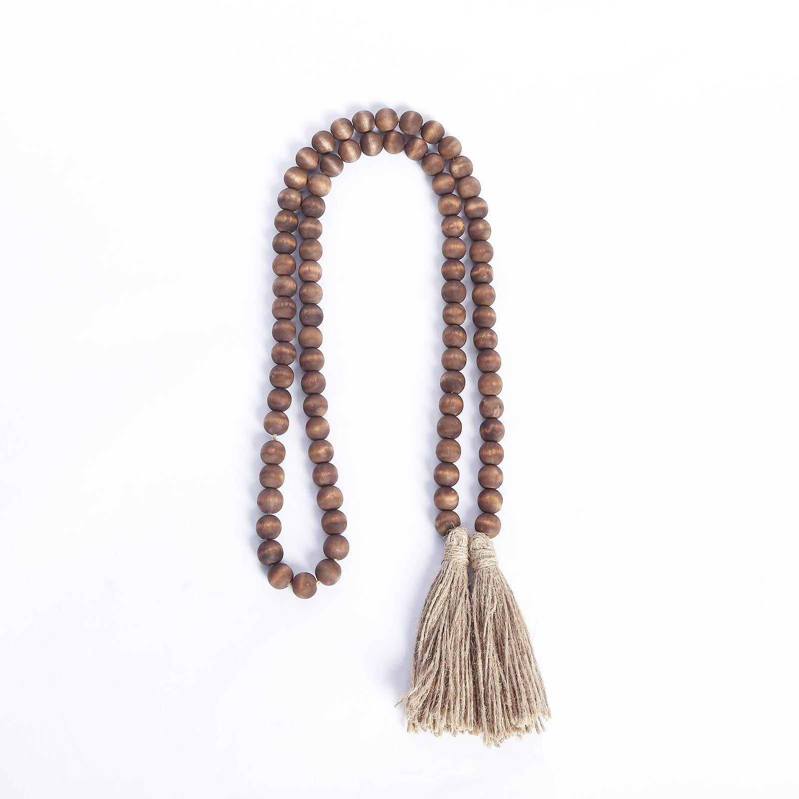 Brown rustic boho chic wood bead garland with tassels.