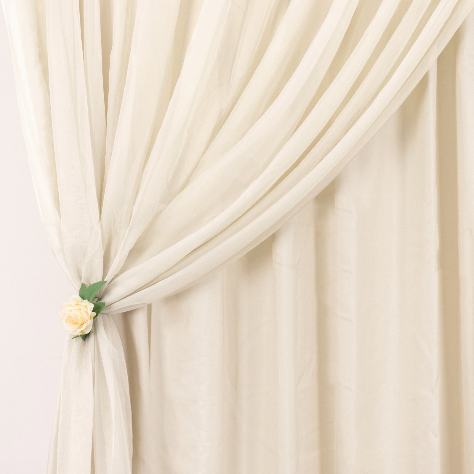 Beige chiffon polyester event curtain drapes with dual layer design.